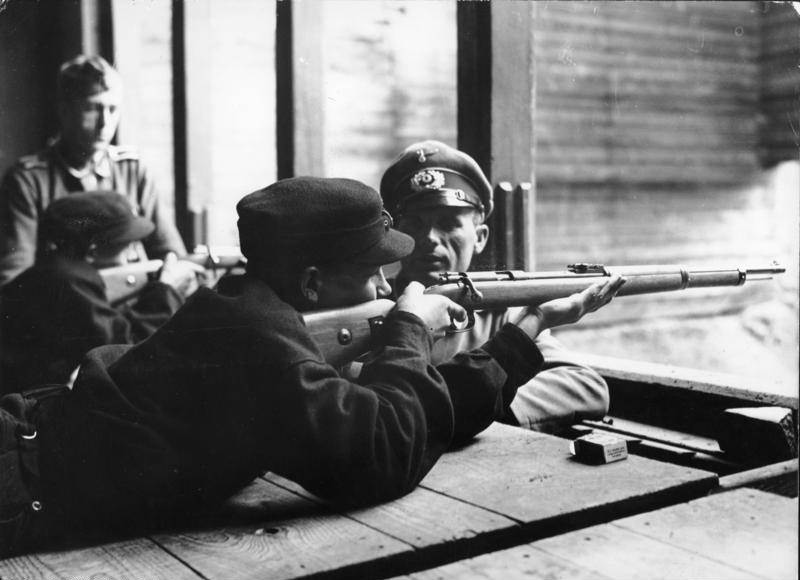 Hitler Youth members learning how to fire rifles, date unknown.