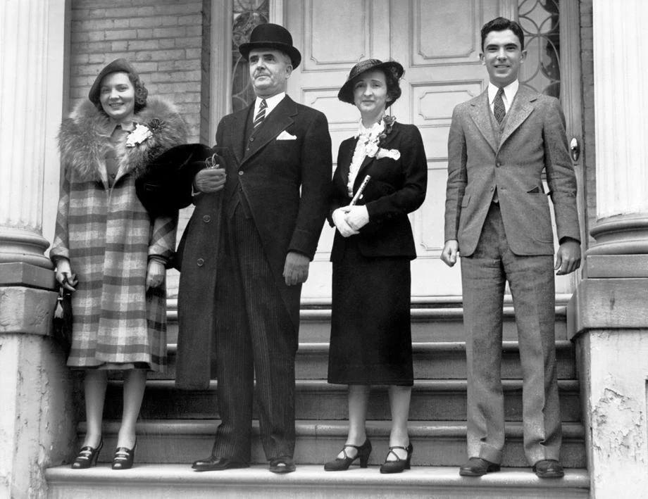 Virginia Gov. James H. Price and wife Lillian (center) left the Executive Mansion for a church service, 1938.