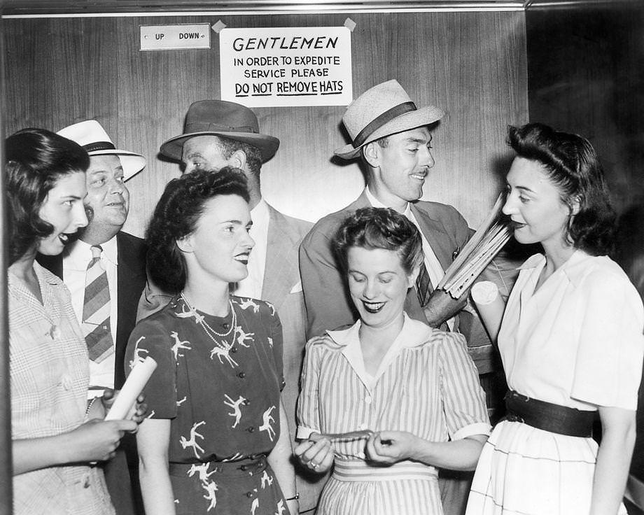 An executive of Atlantic Life Insurance Co. posted a sign in the elevators at the office building at Main and Sixth streets in downtown Richmond, 1943.