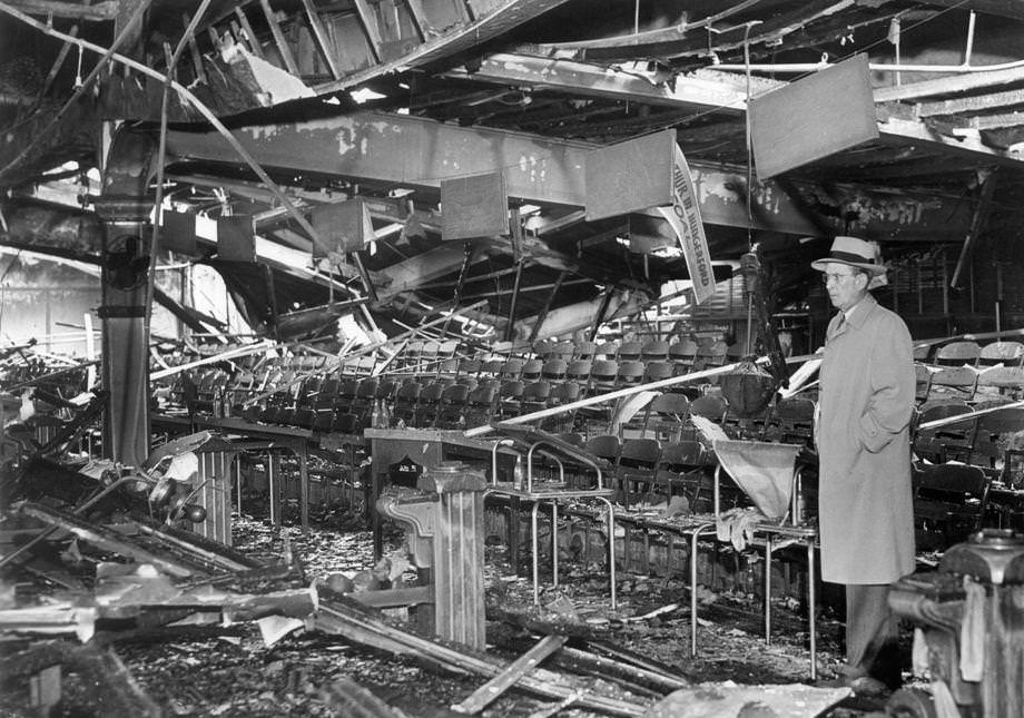 William H. Haskins gazed over what was left of his Health Centre Inc. bowling alley at Hermitage Road and Meadow Street in Richmond after a fire, 1943.