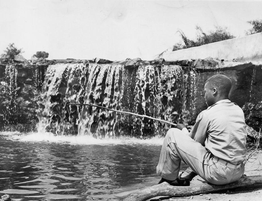 David Singleton fished below the spillway at Birchin Lake in Nottoway County, 1948.