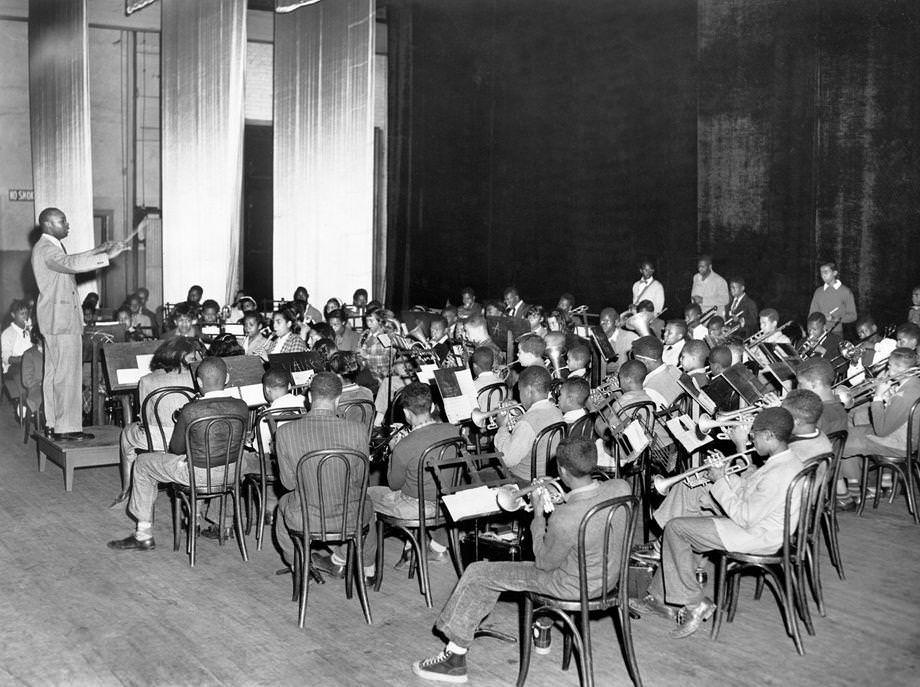 Eldridge E. Scales of Maggie Walker High School conducted an elementary school band rehearsal for the Richmond public schools’ annual spring music festival, “One World Through Music.”