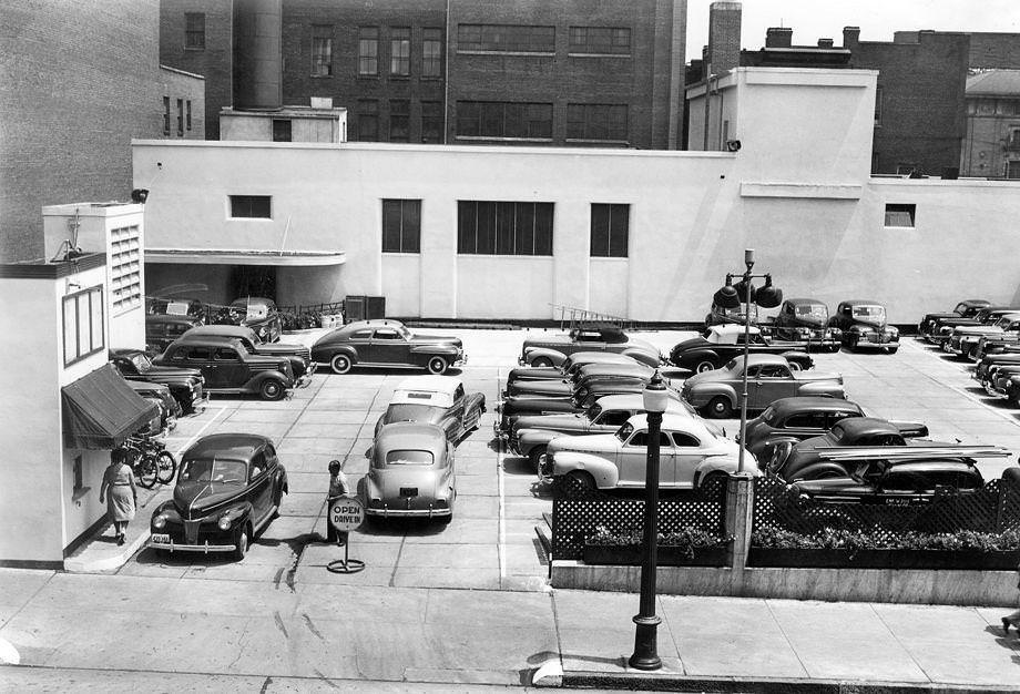 Thalhimers was allowing nighttime use of part of this parking area, at Seventh and East Grace streets downtown, as the Parking Lot Canteen, a place for service members to spend their evenings dancing under the stars, 1943.