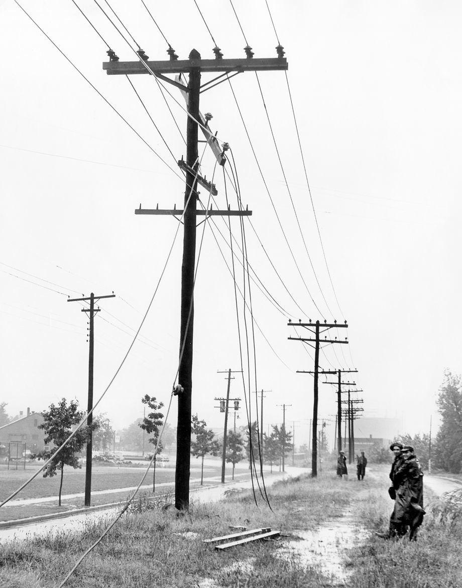 A power line on Brook Road was a tangled mess of wires after a lightning strike during a storm, 1949.