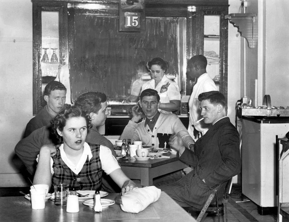 Teenagers visited the newly reopened Main Street Station Dining Room in Richmond, which was closed for a month to allow for remodeling required by the city, 1943.