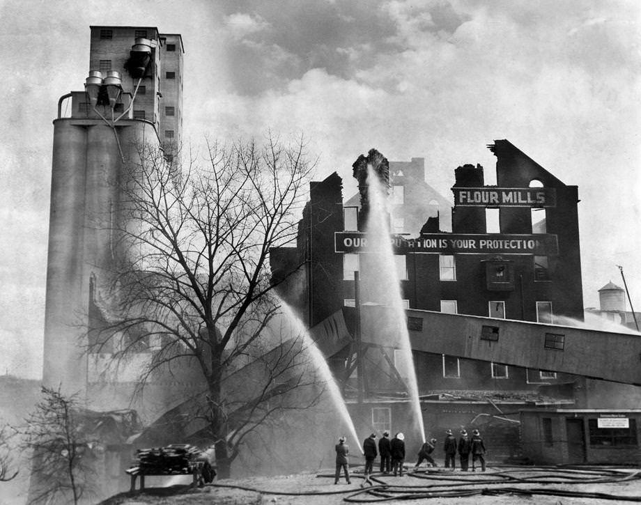 Smoldering embers and charred, jagged walls were all that remained of the Dunlop Mills in South Richmond, 1949.