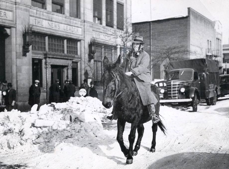 Richmond News Leader reporter Merritt K. Ruddock rides Belle the mule from Bon Air to downtown Richmond on Jan. 25, 1940, after 21.6-inch snowfall paralyzed the region.