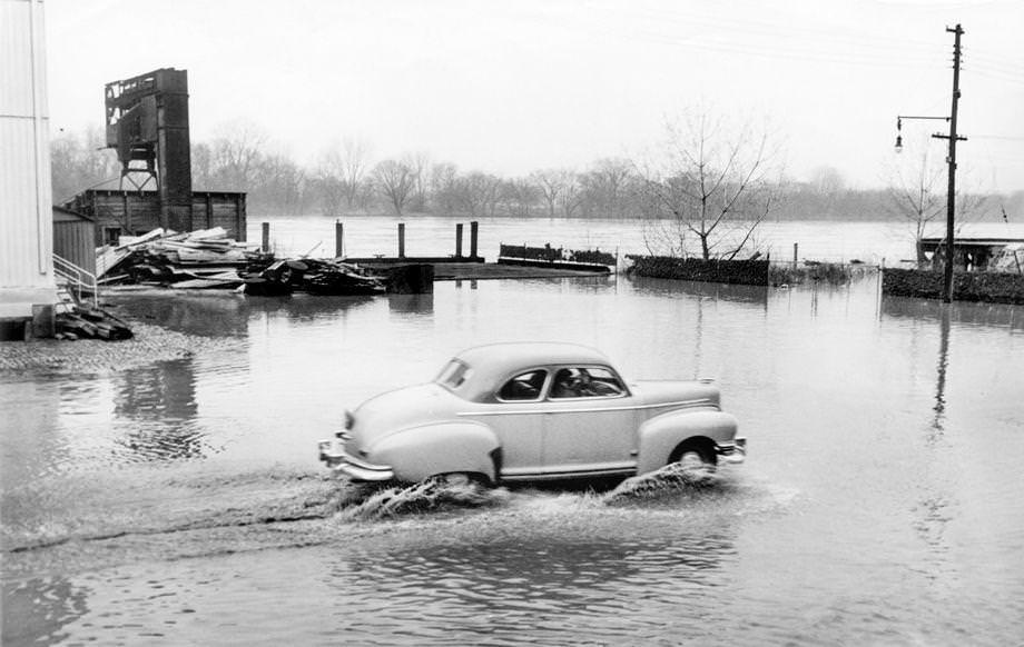 High water on Dock Street in downtown Richmond followed a brief flood that caused no damage, 1949.