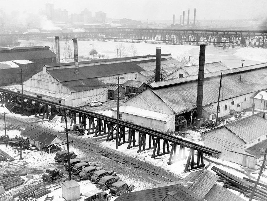 The 76-year-old trestle across the James River that Southern Railway used to haul coal and iron between the Old Dominion Iron and Steel mill and Tredegar Co. was being removed, 1948.