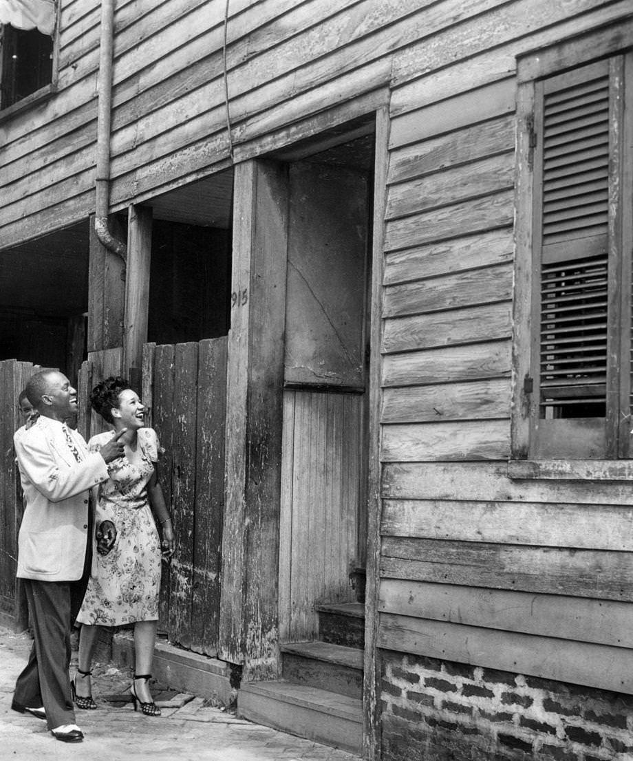 Tap dancer Bill "Bojangles" Robinson showed his wife, Elaine, the house at 915 N. Third St. in which he was born, 1945.