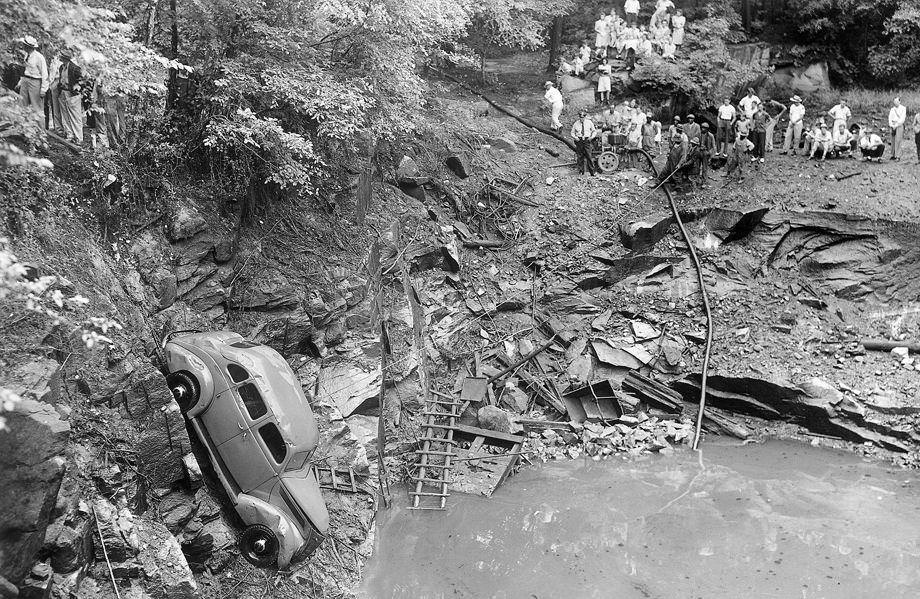 Workers lifted a car – temporarily – from the middle quarry at Bryan Park, 1942.