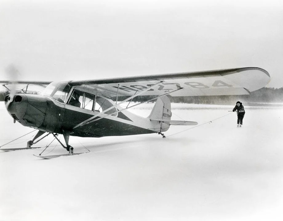 Mrs. Hunter Jones hitched a ride behind a ski plane that was visiting Chesterfield County’s Parnell Field, which opened in March 1946 as the first postwar airport in the Richmond area, 1957.