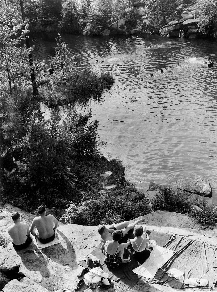 Swimmers cooled off on a hot day at Granite Quarry in Chesterfield County, 1954.