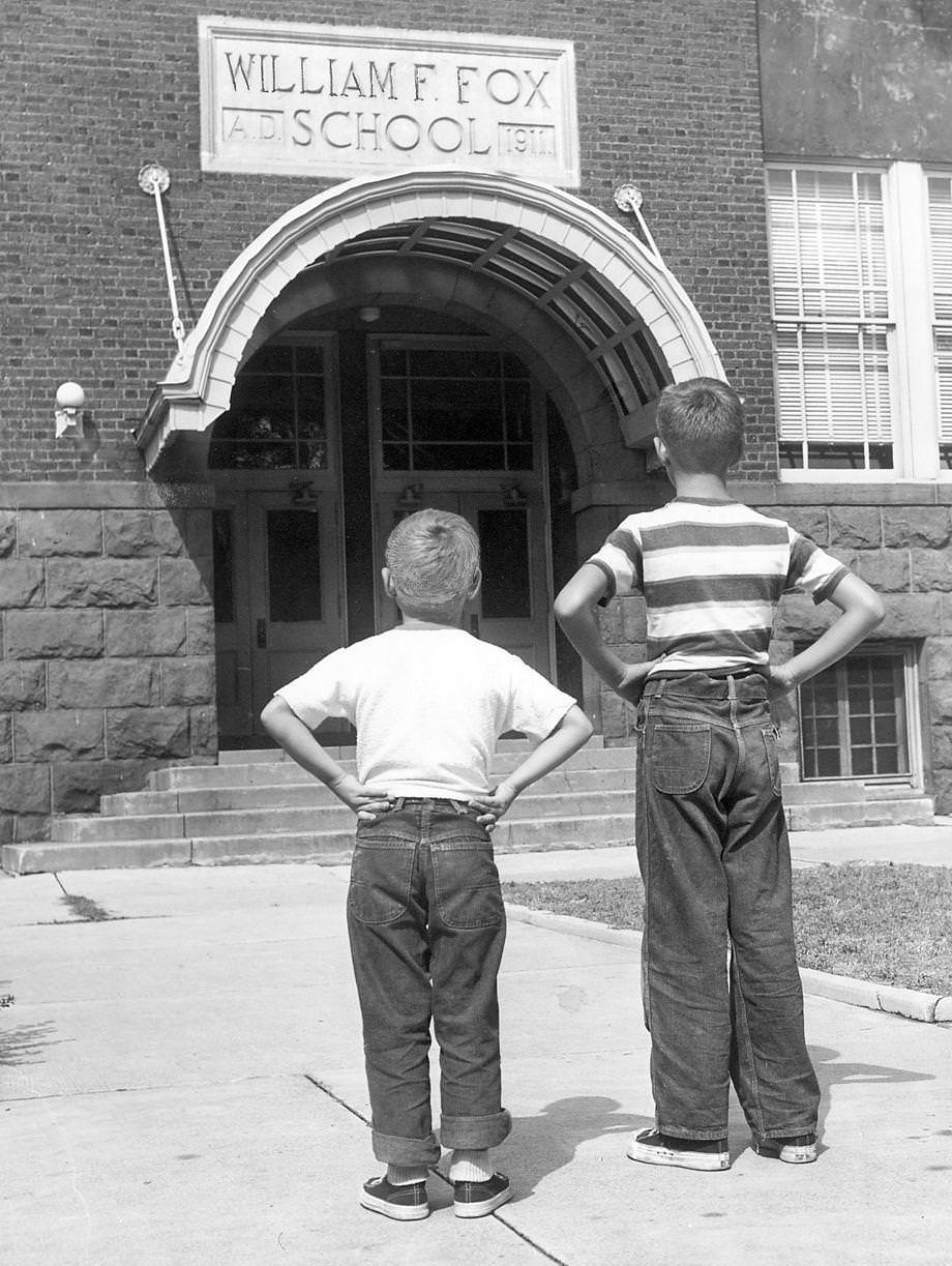 Two boys surveyed the William F. Fox School, which they were ready to attend within days, 1953. The Richmond school, on Hanover Avenue in the Fan District, was dedicated in September 1911.