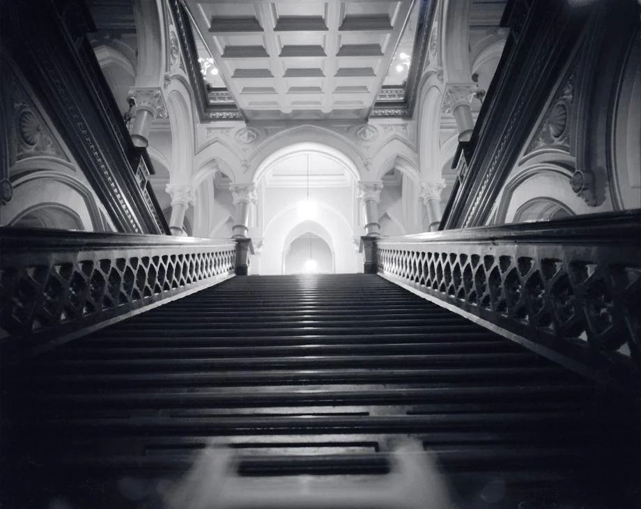 View of a staircase at Old City Hall, 1959.