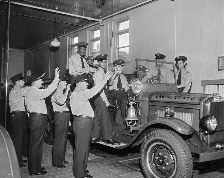 Richmond's first black firefighting unit took charge of Engine Co. 9 at Fifth and Duval streets. Capt. J.G. Forristal, seated beside the driver, remained head of the station, and white members who waved to their colleagues were transferred.