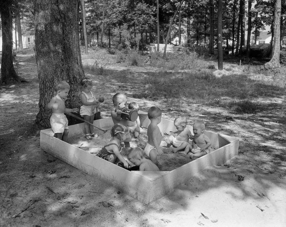 Children playing on the Westwood Terrace playground, 1950. Some new homes in the development were offered for less than $10,000 that year.