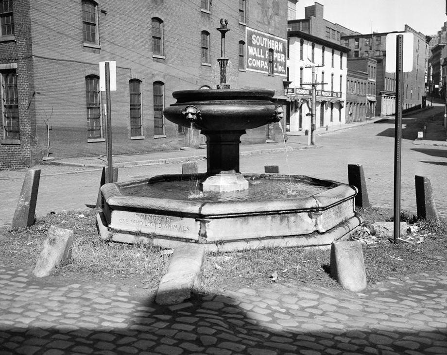 The horse fountain on Shockoe Lane, the small stretch at 13th and East Cary streets that is now referred to as Shockoe Slip, 1950.