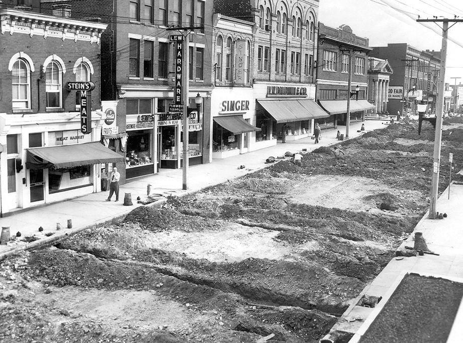 The area of Hull Street between 12th and 13 streets in South Richmond was dug up for utility work and street rebuilding, 1951.