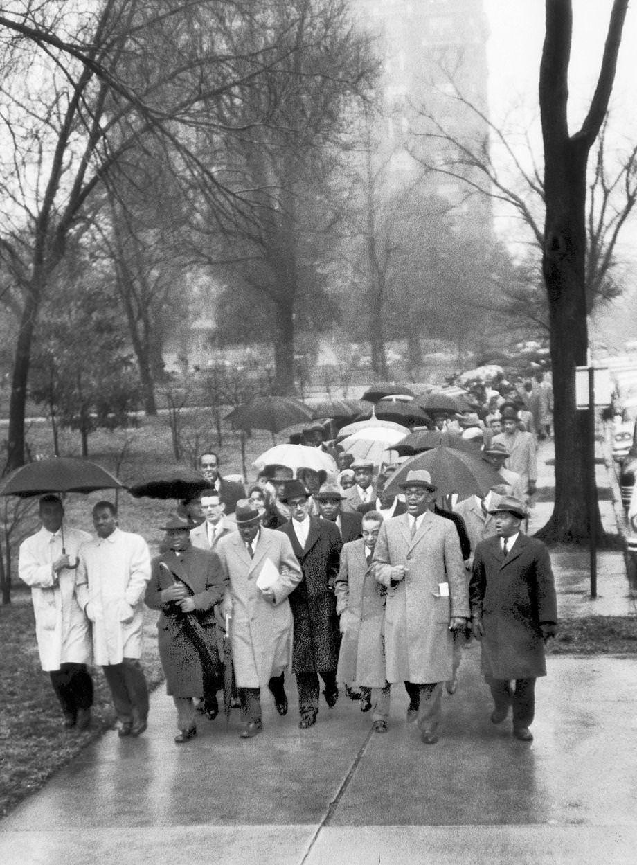 Protesters marched through the rain to the state Capitol in Richmond to support school integration, 1959.