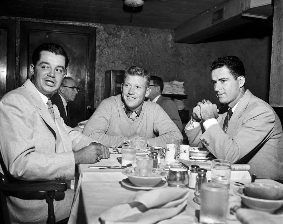 New York Yankee star Mickey Mantle (center) had breakfast with teammates Bill Miller (left) and Jerry Coleman at the Hotel John Marshall before the team played the Richmond Virginians on April 8, 1954, to open Parker Field.
