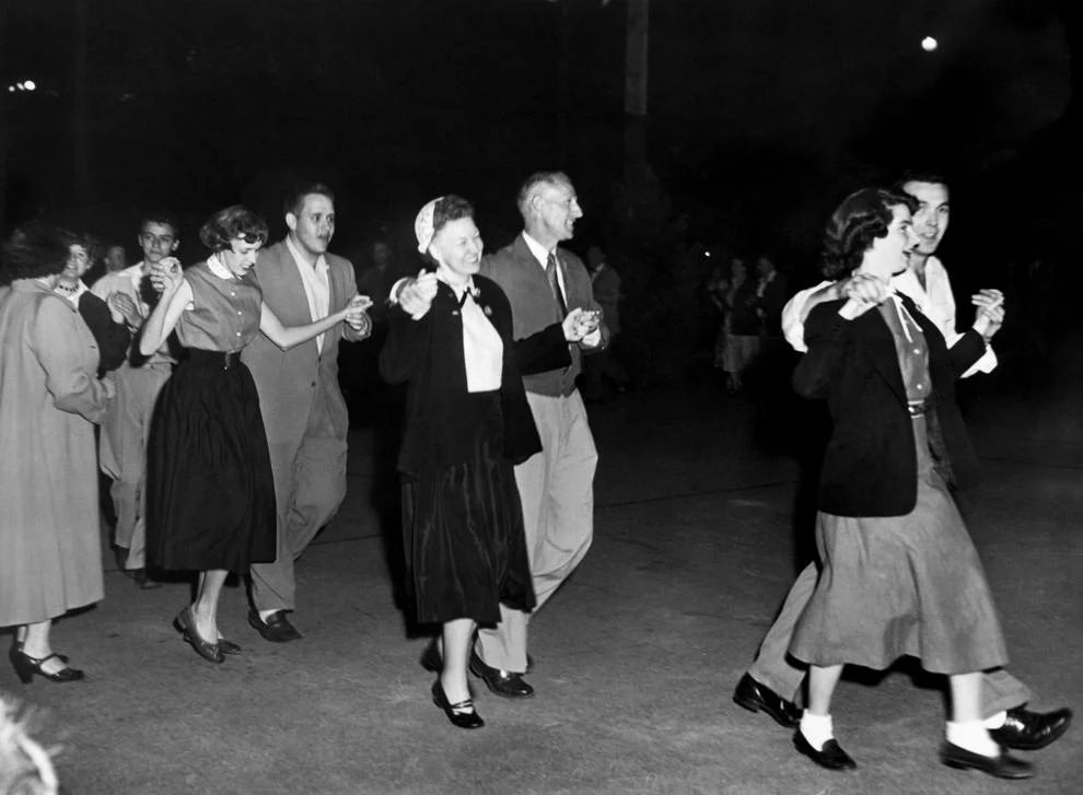 Richmonders attended a square dance at the Byrd Park tennis courts to kick off Park and Recreation Week. Other events included festivals, concerts, games and exhibits, 1954.