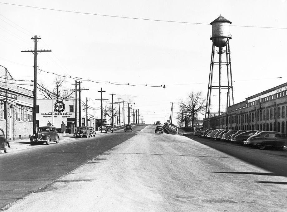 Work was scheduled to begin to widen this south end of the North Boulevard railroad overpass, 1950.