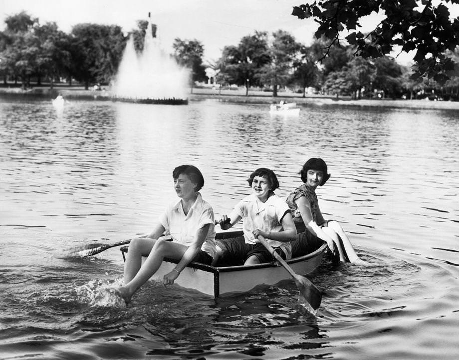 These young ladies cooled off during a heatwave and enjoyed a boat ride on Fountain Lake at Byrd Park in Richmond, 1950.