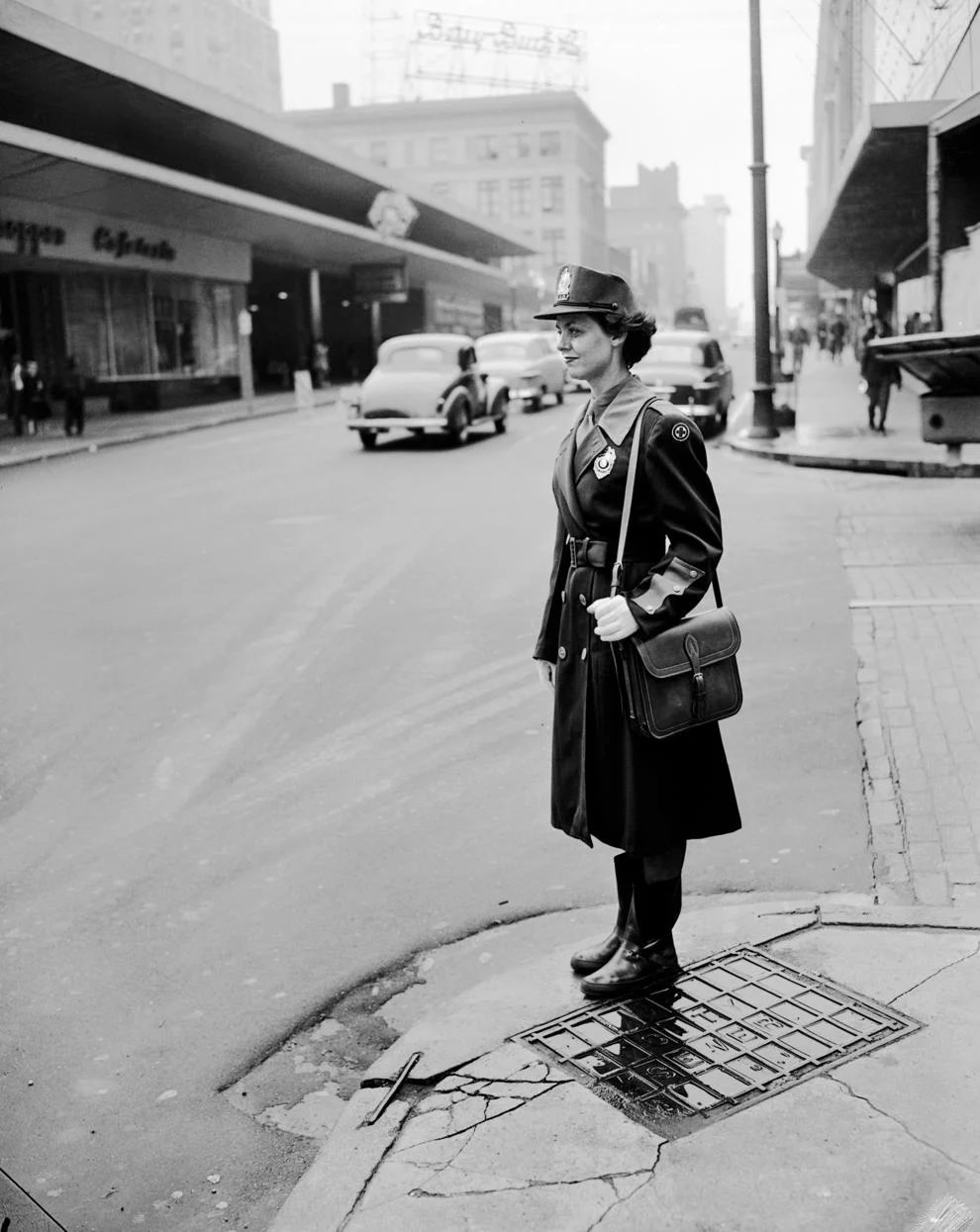 Mrs. M.S. Jackson, one of Richmond's first full-fledged female traffic officials with full police authority, worked at Seventh and Grace streets downtown, 1952.