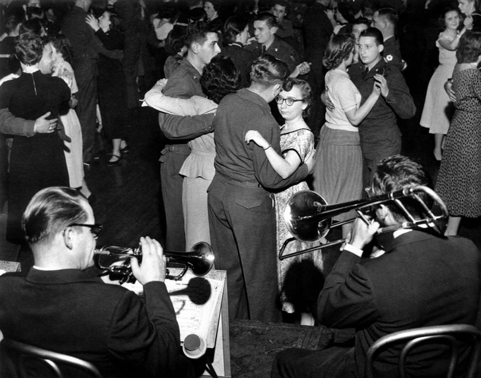 Hundreds of dancers crowded the floor of the Winter Garden at the Hotel Richmond to mark the first anniversary of a series of Saturday night hotel dances for military members, 1951.