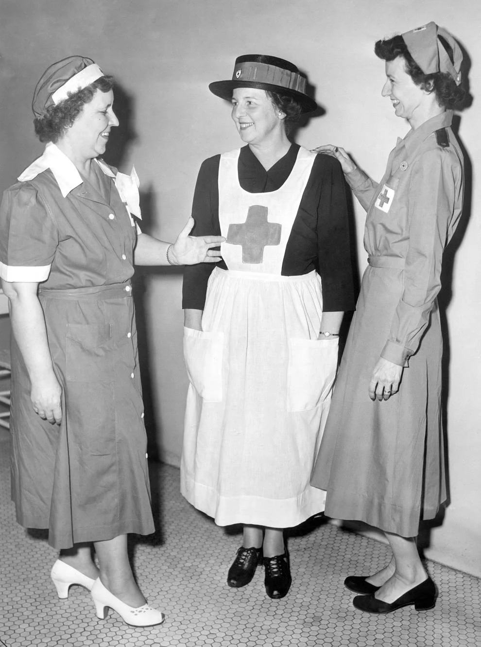 Three American Red Cross canteeners, representing three war periods, gathered for the Richmond chapter’s rally marking the graduation of the first group of canteeners to be trained since World War II, 1951.