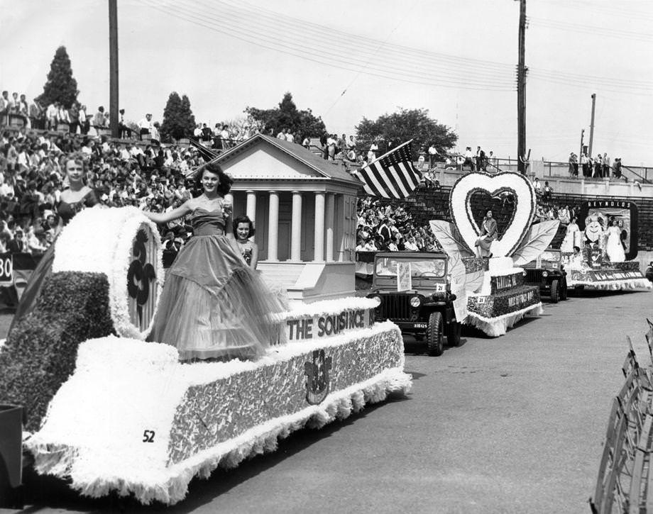 Floats in the National Tobacco Festival parade completed their promenade around City Stadium before the football game between the University of Richmond and Hampden-Sydney College, 1954.