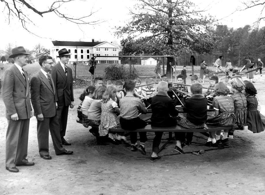 The new whirlaway, a merry-go-round type of gadget turned by the foot power of dozens of students, was popular at Dumbarton Elementary School in Henrico County, 1953.