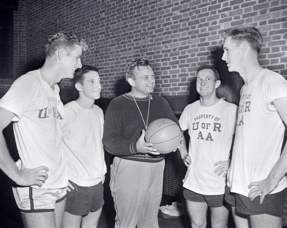 University of Richmond basketball coach Les Hooker was surrounded by four returning members from the previous season’s team, which won the Big Six title in Hooker’s first season and earned him coach of the year honors, 1953.