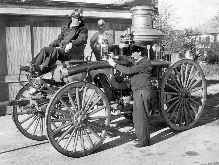 Firemen W.M. Alley and J.B. Winston mounted Richmond’s oldest fire engine, Old 798.