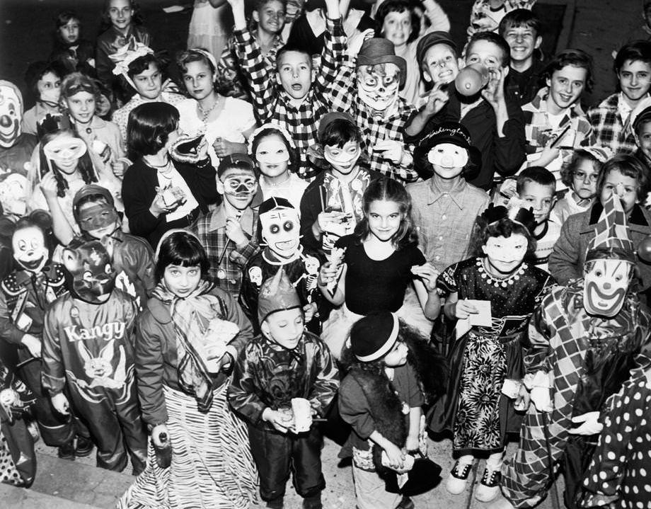 A group of costumed children celebrated Halloween at the William Fox playground in Richmond, 1954.