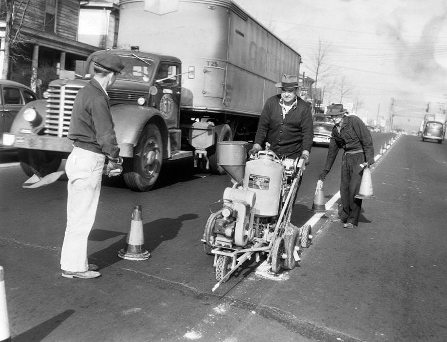 Richmond city workers painted lane lines on Cowardin Avenue using a new power-driven machine, 1953.