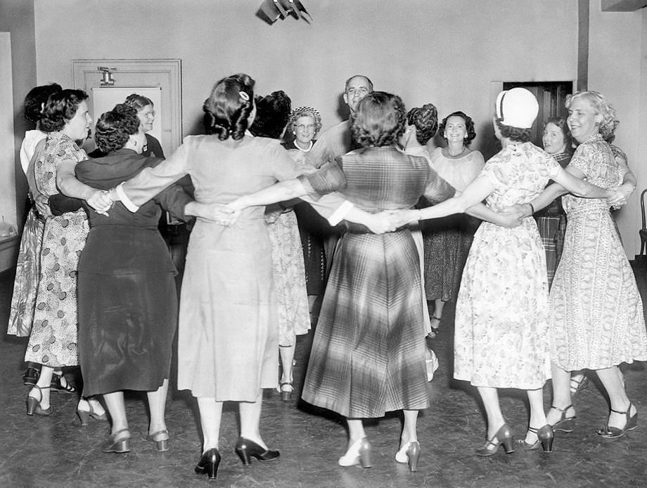 Square dance caller Richard Chase taught playground directors some steps ahead o f a dance scheduled for the Byrd Park tennis courts in Richmond as part of Park and Recreation Week, 1951.