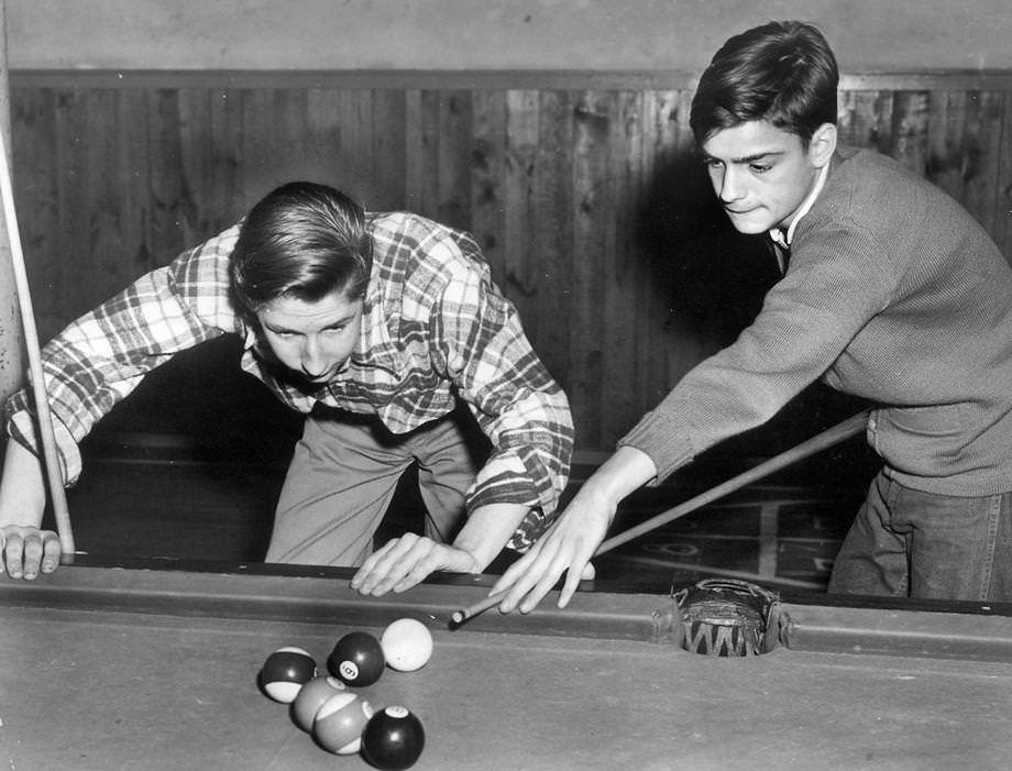 Bobby Seal (left), 15, and Marvin “Kayo” Williams, 14, played billiards on the new table at the Salvation Army’s Red Shield Boys Club, which was on Church Hill in Richmond, 1950.