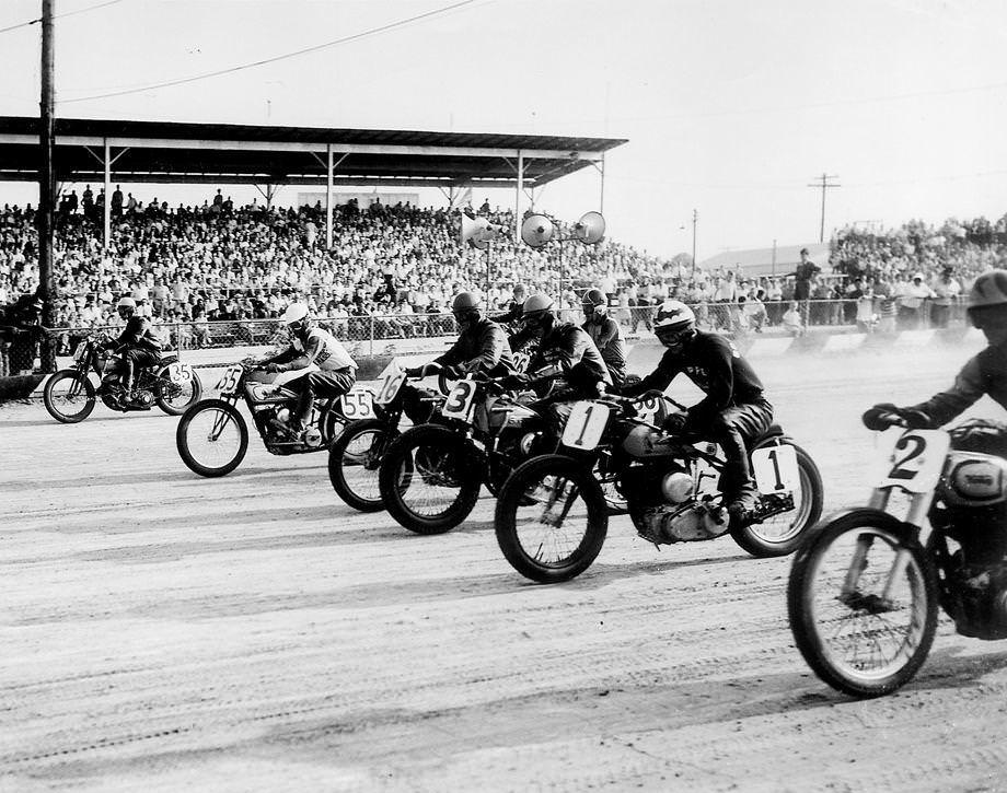 Motorcyclists raced in the 10-Mile National Motorcycle Championship at the Atlantic Rural Exposition grounds in Henrico County, 1952.