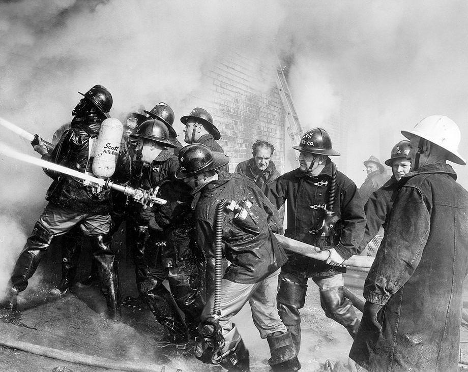 Firefighters battled at blaze at L.R. Brown & Co., a furniture store on Hull Street in South Richmond, 1952.