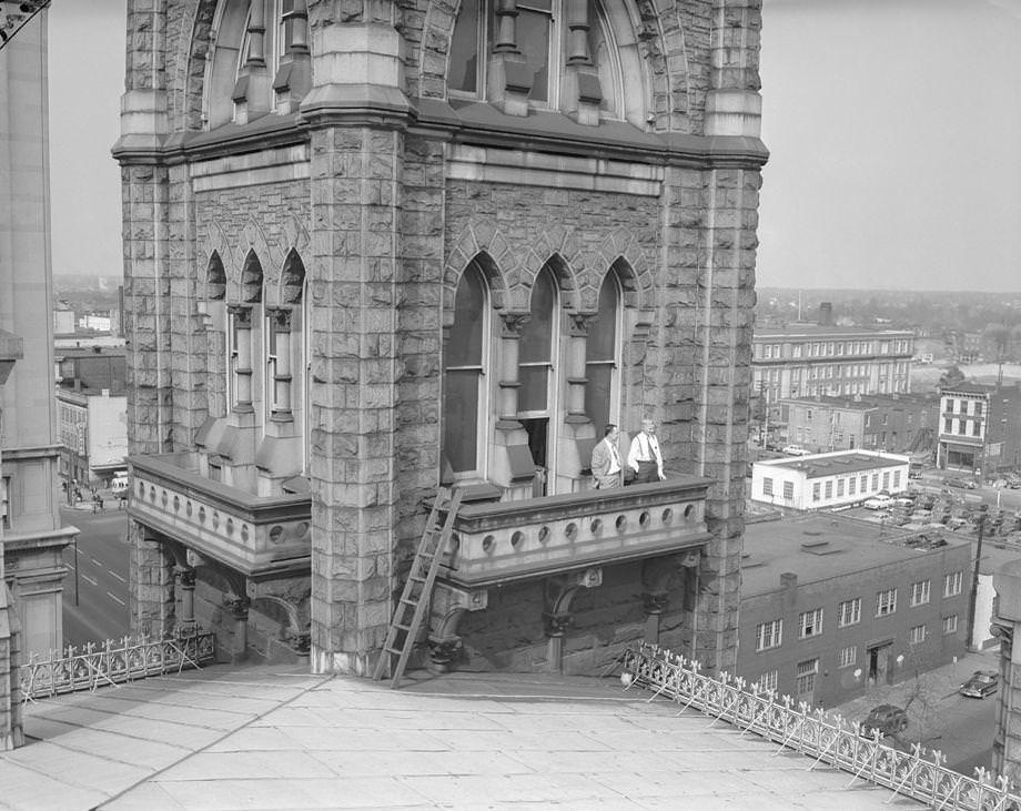 Several stories below the clock itself, four small balconies jut out from the clock tower on Old City Hall in downtown Richmond.