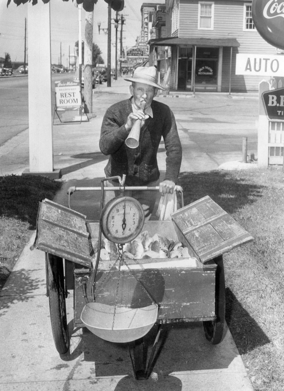 Alonzo Moore, 74, walked down a street in Cape Charles on Virginia’s Eastern Shore and blew his horn, alerting locals to his sale of the fresh catch of the day, 1951.