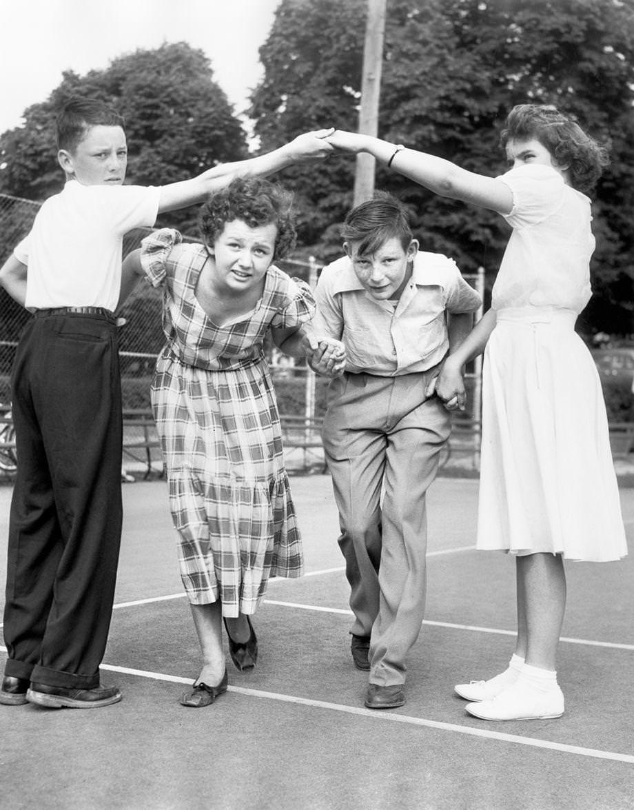 Clifford Burgess (from left), Harlean Bibb, Charles King and Shirley Kingsley, who attended Summer Hill School in South Richmond, practiced a square dance called “Duck for the Oyster”, 1950