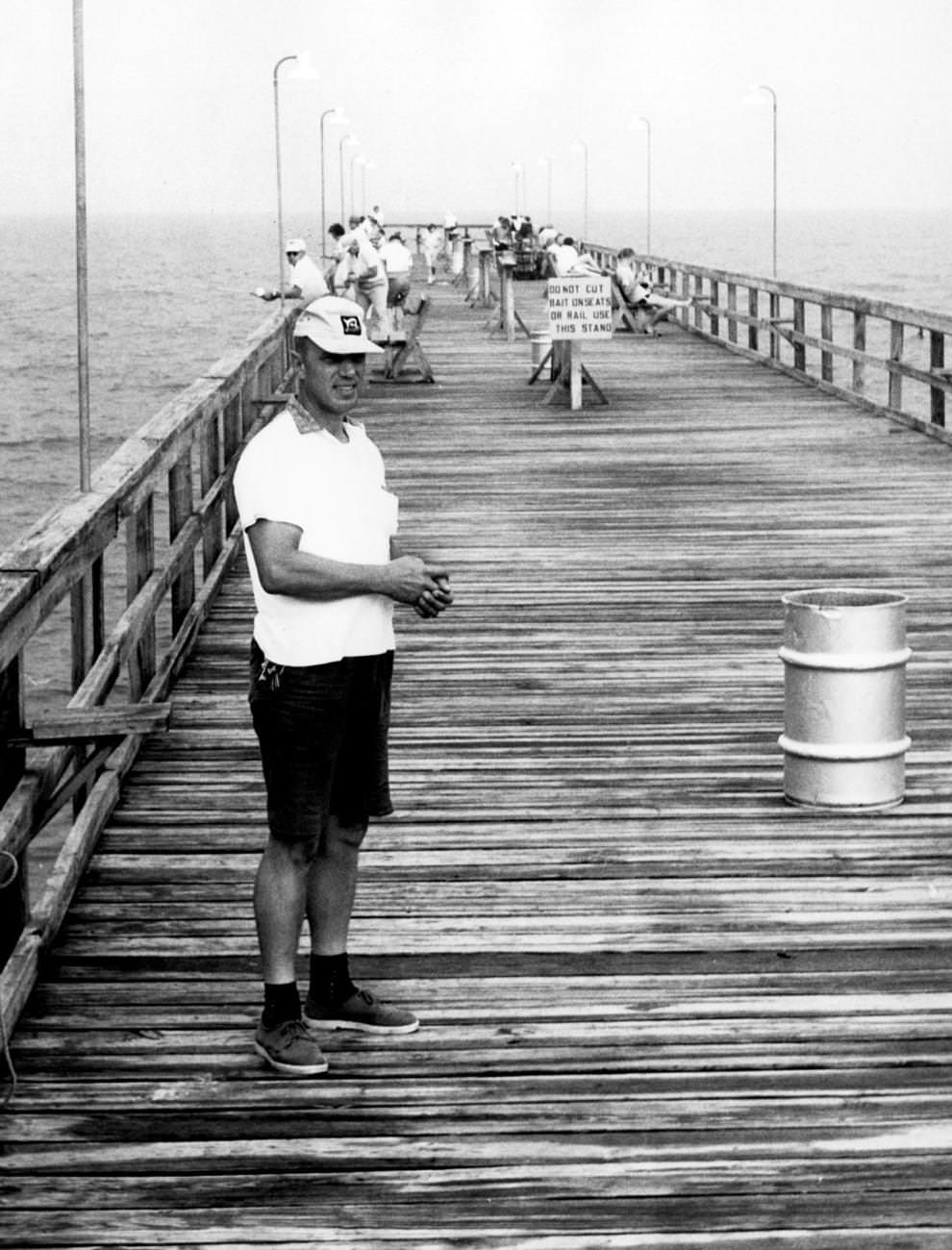 George C. “Skid” Abbott, who had converted the old Gordon’s fish packing house at Buckroe Beach in Hampton into a popular sport-fishing pier that attracted anglers for day and night fishing, 1961.