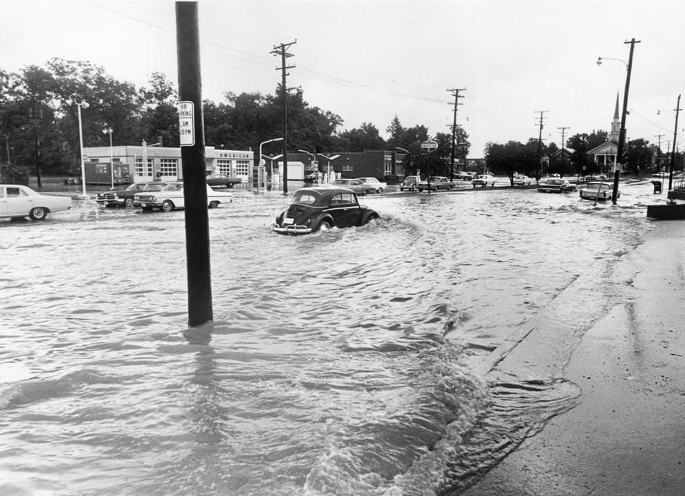 Drivers navigated a flooded Westover Hills Boulevard in South Richmond after heavy rainfall, 1969.