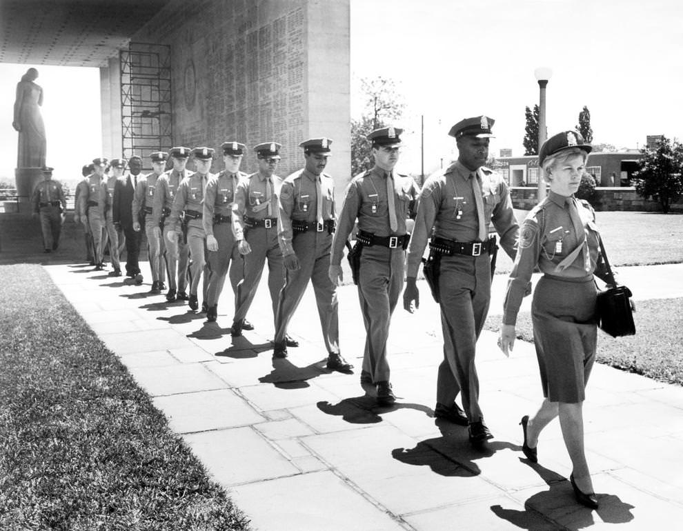 15 members of the Richmond Police Bureau graduated from the 22nd session of the city’s basic police school in a ceremony at the Virginia War Memorial on South Belvidere Street, 1965.