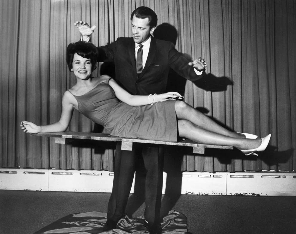 Magician Mark Wilson performed a levitation trick on Terry Bryant at the Hotel John Marshall in Richmond, 1963.