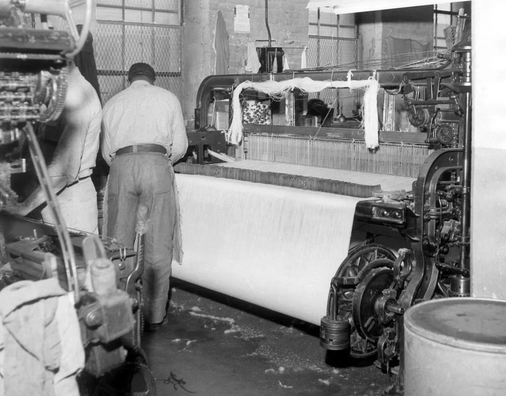 An inmate at the Virginia State Penitentiary in Richmond worked on a loom to create cotton cloth, 1960.