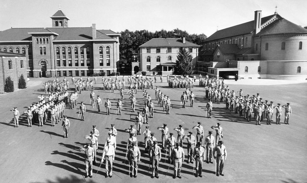 The Benedictine cadet corps stood in formation behind the high school, which was celebrating its 50th anniversary that fall, 1961.